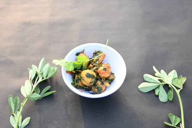 istock Aloo Methi or Fenugreek potato vegetable. 1909378327