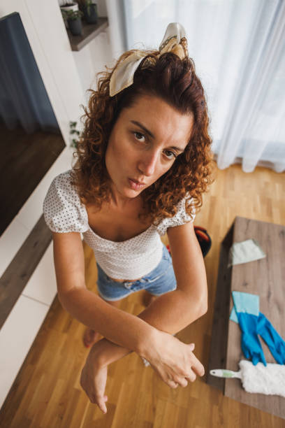 istock Woman Cleaning House 1909388329