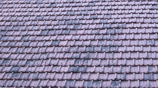 Pattern of row of old terracotta roof tile for background
