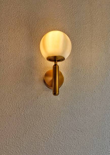 istock Yellow gold illuminating ball lamp 1909448558