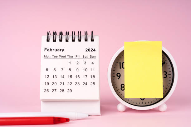 istock February 2024 Desk Calendar on Pink Background 1909448629
