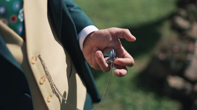 Man with pocket watch and stylish vest
