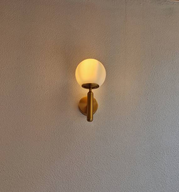 istock Yellow gold illuminating ball lamp 1909505104