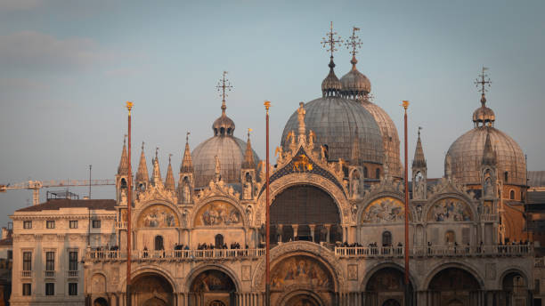 istock Saint Mark's Basilica in Venice in golden sunset hour 1909544522