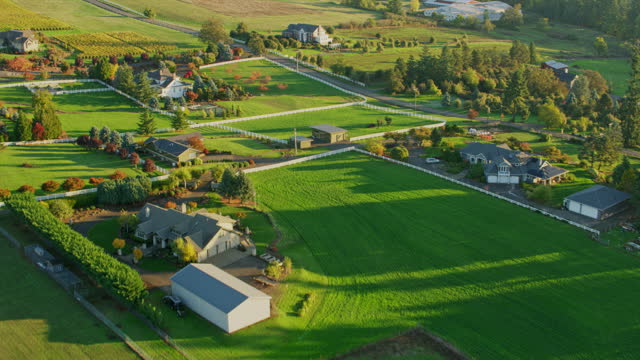 AERIAL Houses with white fences in the countryside in Oregon, USA