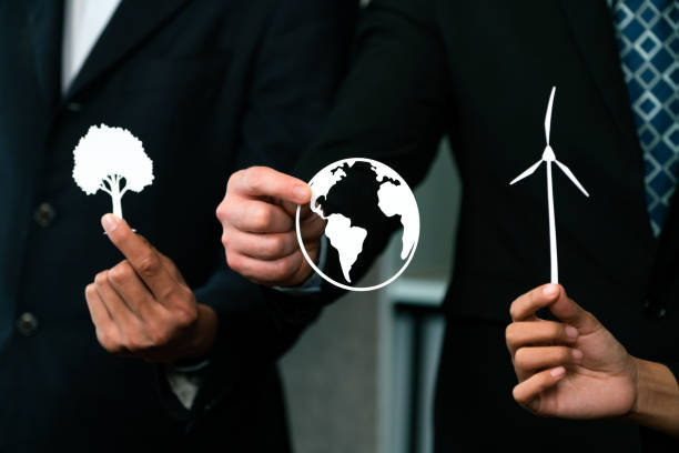 istock Group of business people holding alternative net zero energy icon. Quaint 1909562026