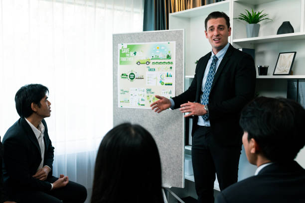 Businessman leader give presentation on eco-friendly implementation. Quaint