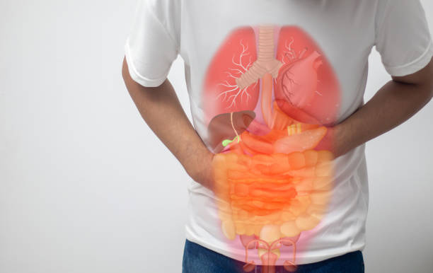 istock man having abdominal pain on white background 1909589670
