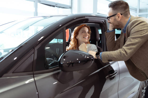 istock Couple buying their new car 1909626200