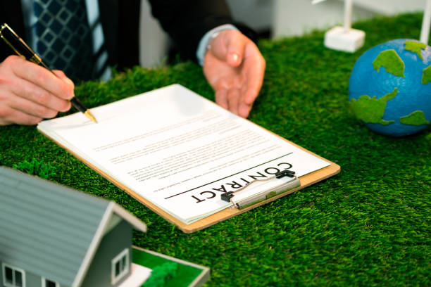 istock Businessman or CEO in office signing environmental regulation. Quaint 1909643729