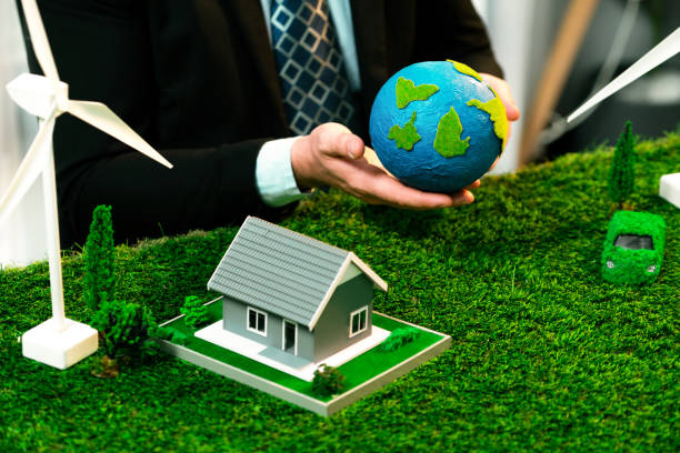 istock Businessman or CEO holding paper globe in office. Quaint 1909644105