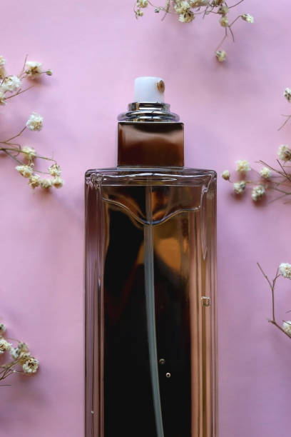 istock Perfume Bottle and Gypsophila Flowers 1909691906