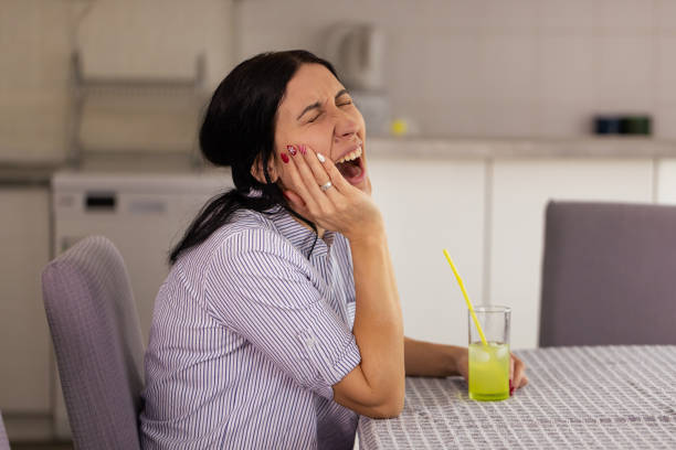 istock Woman Feeling Tooth Pain 1909693468
