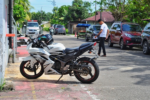 Riau-Indonesia, january 3rd 2024 : kawasaki ninja is parked at street