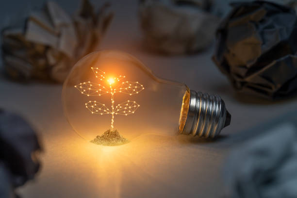 istock New life concept with artifical plant inside classic light bulb 1909703494