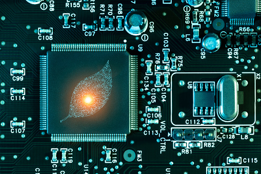 Artificial intelligence leaf computer chip concept on circuit board. This file is cleaned and retouched.