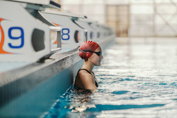 istock A professional swimmer in a pool preparing for action. 1909717741
