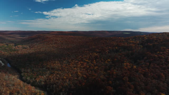 Vista Of Autumnal Forestland Near Lee Creek River Near West Fork In Washington County, Arkansas, USA. Aerial Wide Shot