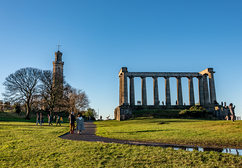 Edinburgh, UK. 26 December 2023. Tourists at the National Monument of Scotland in Edinburgh.