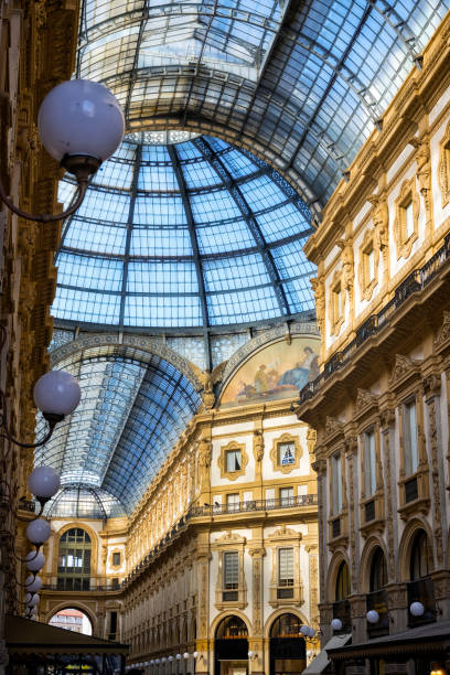 holidays in italy - inside the galleria vittorio emanuele ii in milan - milan italy contemporary architecture shopping photos et images de collection