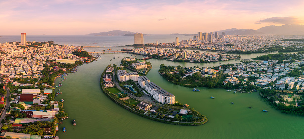 Drone view of Cai river front in Nha Trang city with islands and bridge connect - Khanh Hoa province, central Vietnam