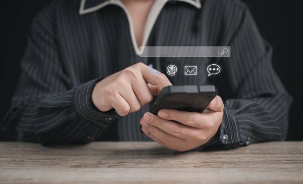 istock digital social media online concept : business man using his mobile or smart phone for chat , order his work or playing social media and search something is interesting while he was resting. 1909846247