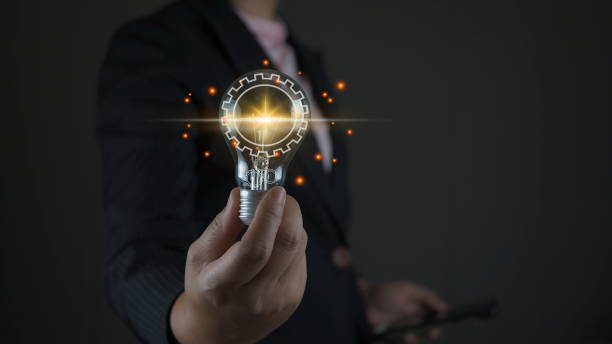istock Creative idea. Concept of idea and innovation, Businessman holding light bulb. Idea concept with innovation and inspiration for business or education, Creative thinking and learning. 1909852039