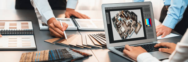 istock Group of interior architect at table choosing material selection. Insight 1909854725
