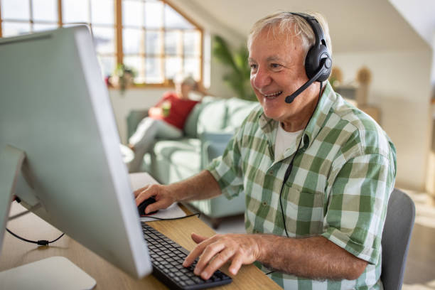 istock Senior man gamer 1909858946