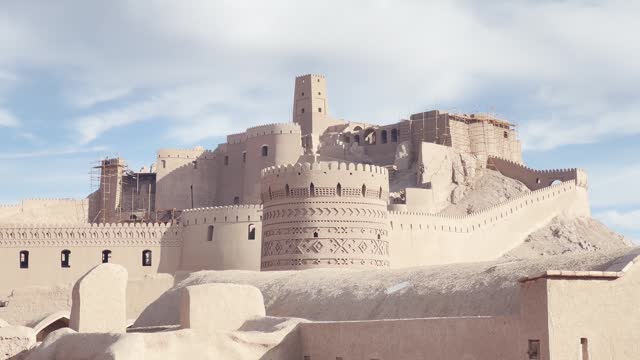 Restored Arg-e Bam Citadel, Kerman, Iran under blue skies