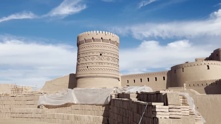 Ornate Tower of Arg-e Bam, Iran Under Blue Skies