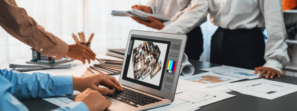 istock Group of interior architect designer discussing together with software. Insight 1909879562