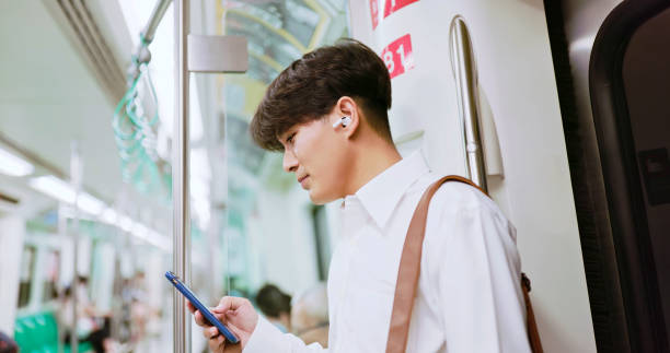 istock man listen music with earbuds 1909894838
