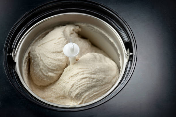 Preparation of homemade vegan coconut ice cream in machine