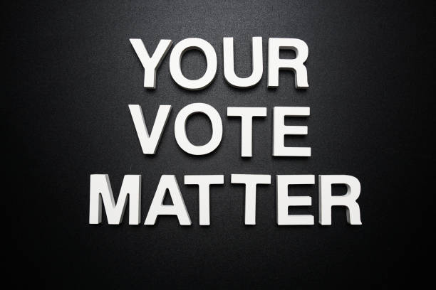 istock Your Vote Matters alphabet letter on black background 1909942393