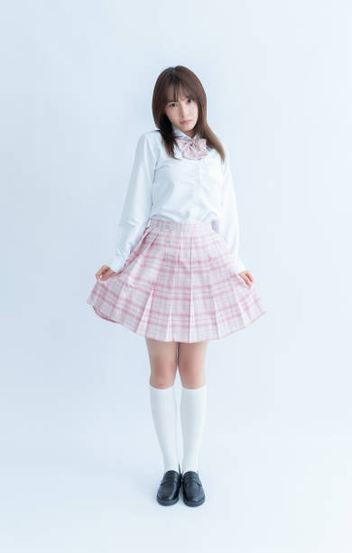 asian school girl in white shirt and pink plaid skirt - east asian ethnicity japanese ethnicity asian ethnicity one person ストックフォトと画像