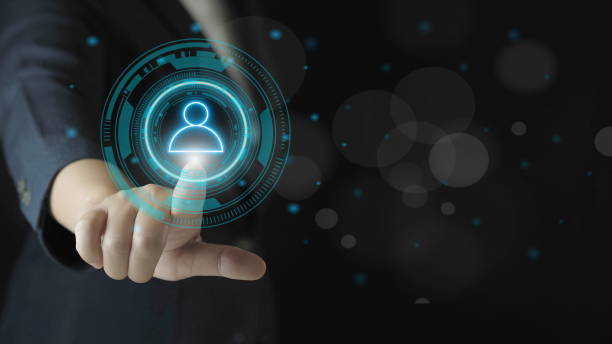 istock Businessman touching to human with focus icon for human development recruitment and customer focus concept. 1909962419