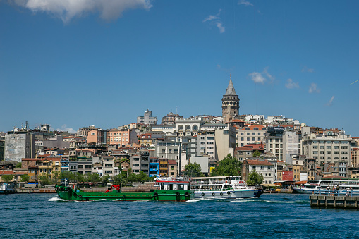 Istanbul city skyline Türkiye, Beyoğlu district old houses Galata tower on top, view from the Golden Horn.