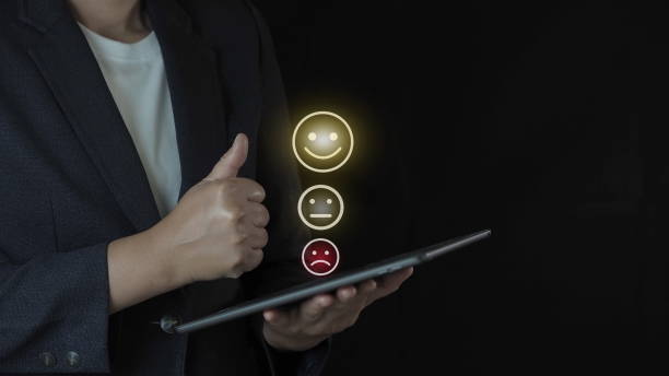 istock Businessman pressing smiley face emoticon on virtual touch screen. Customer service evaluation concept. 1909966064