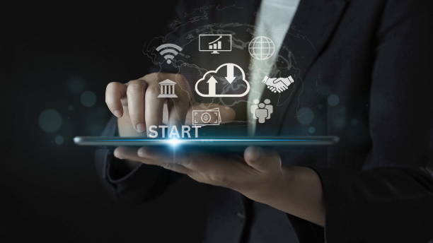 istock Startup concept with icon business and network connection on modern virtual interface from digital tablet. man touching on tablet 1909966075
