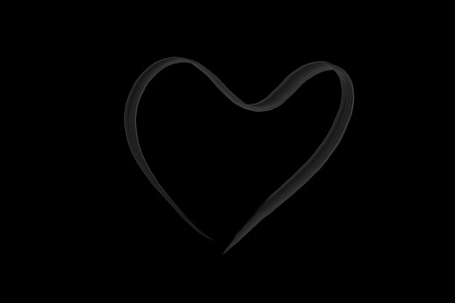 heart shape smoke isolated on dark background