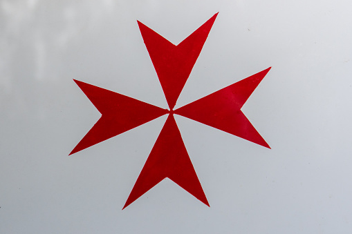 Marsaxlokk, Malta, May 2, 2023. The Maltese cross is a Christian symbol used as a distinctive symbol by religious orders