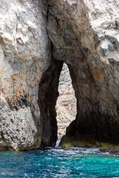 istock Malta, Wied iz Zurrieq, Blue Cave with turquoise waters 1909979644