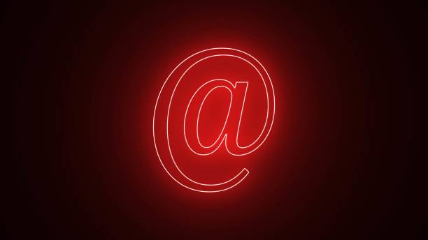 istock Red light @ icon. Colorful email technology icon isolated on black background. 3D rendering, neon light advertising, @bright advertising, banner sign, advertising, @ drawing. 1910074602