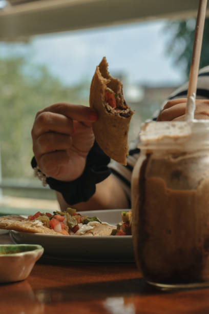 istock Person enjoying a traditional Mexican meal 1910084987