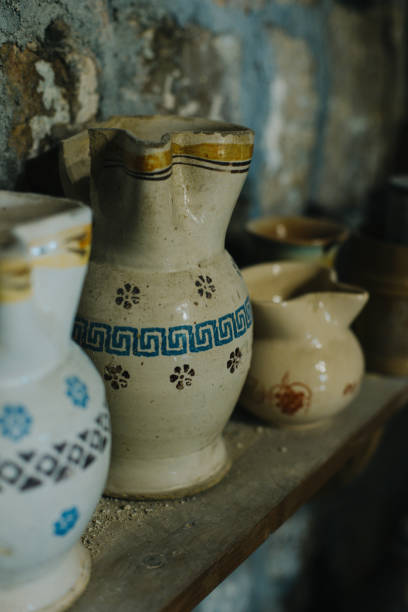 istock Vintage jars in a basement. Old jugs. S 1910090771