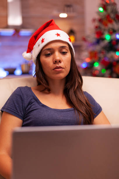 istock Girl looking at laptop screen reading business email 1910121921