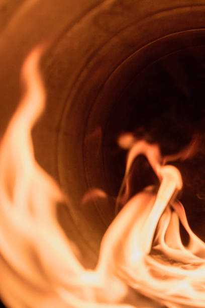 istock combustion system in an open supply fire in a spiral-wound air duct, front and back background blurred with bokeh effect 1910127001
