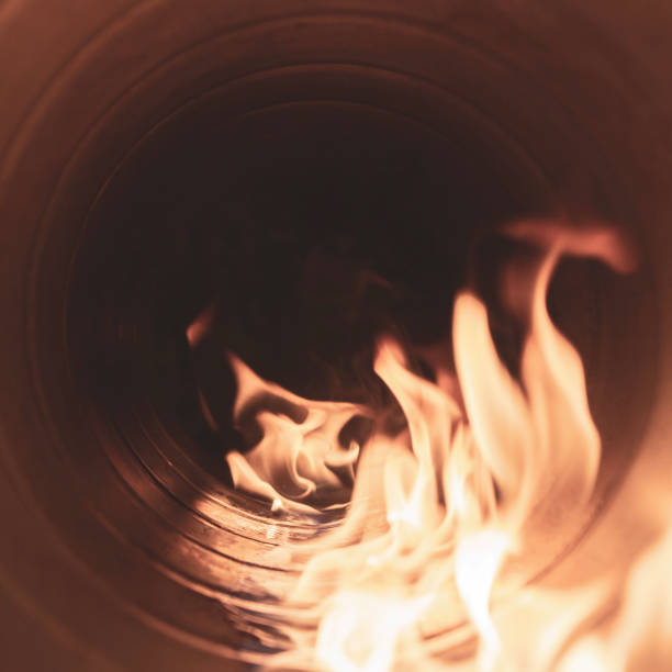 istock combustion system in an open supply fire in a spiral-wound air duct, front and back background blurred with bokeh effect 1910127513