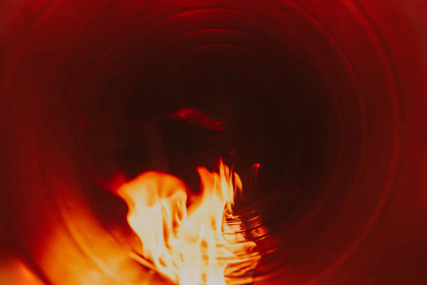 istock combustion system in an open supply fire in a spiral-wound air duct, front and back background blurred with bokeh effect 1910127519